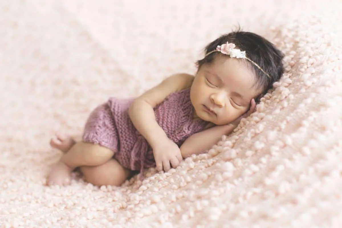 Toddler Lying on Pink Fleece | Cutest Baby Girl Coming Home Outfits | Newborn girl coming home outfits