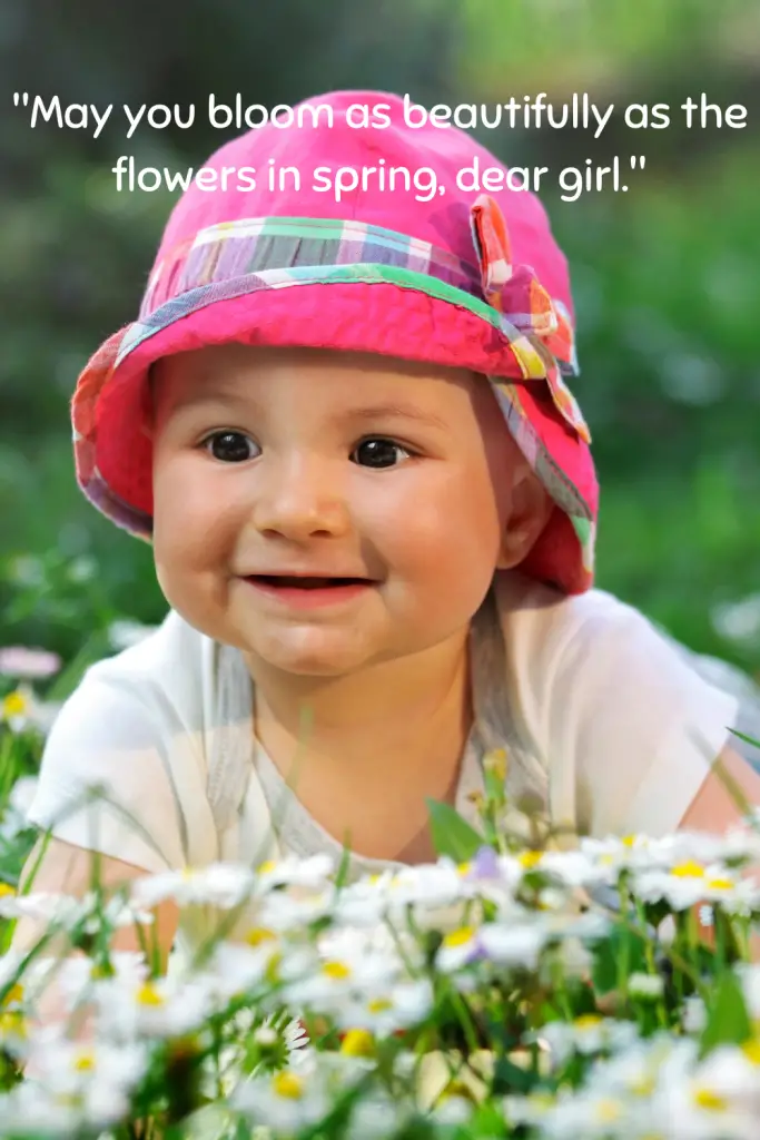 baby girl crawling in flowers